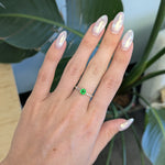 14K yellow gold tsavorite garnet round ring with diamond accents