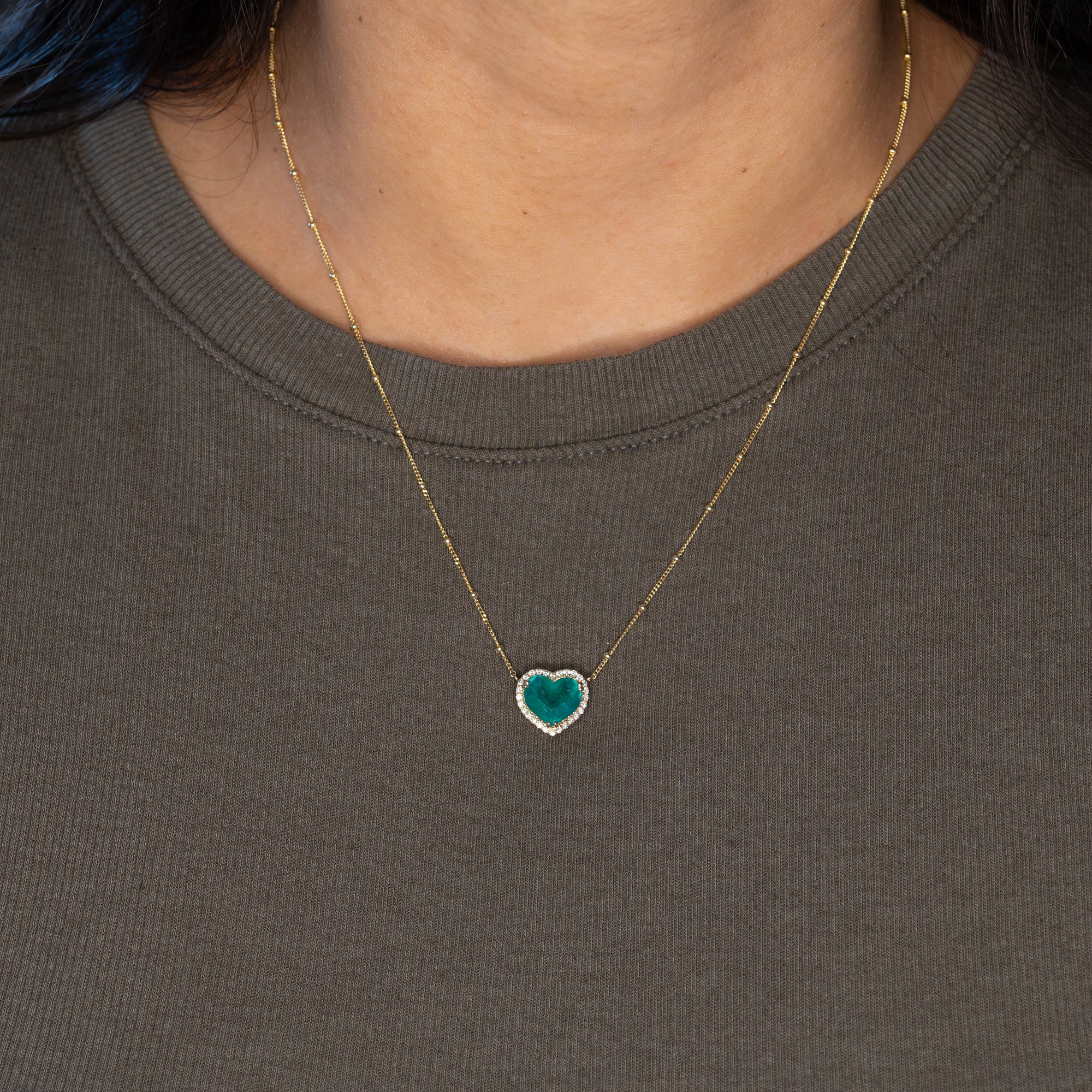 14K yellow gold colombian emerald pendant with diamond accents