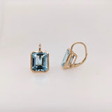Solitaire Swiss Blue Topaz Drop Earrings in 14k Solid Gold | Emerald Cut | Customizable
