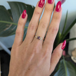 14K yellow gold bezel-set purple spinel ring with diamond accents