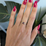 14K yellow gold bezel-set purple spinel ring with diamond accents