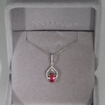 14K white gold padparadscha sapphire pendant