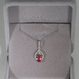 14K white gold padparadscha sapphire pendant