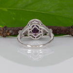 14K white gold pink sapphire oval ring with diamond halo