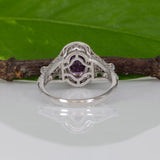 14K white gold pink sapphire oval ring with diamond halo