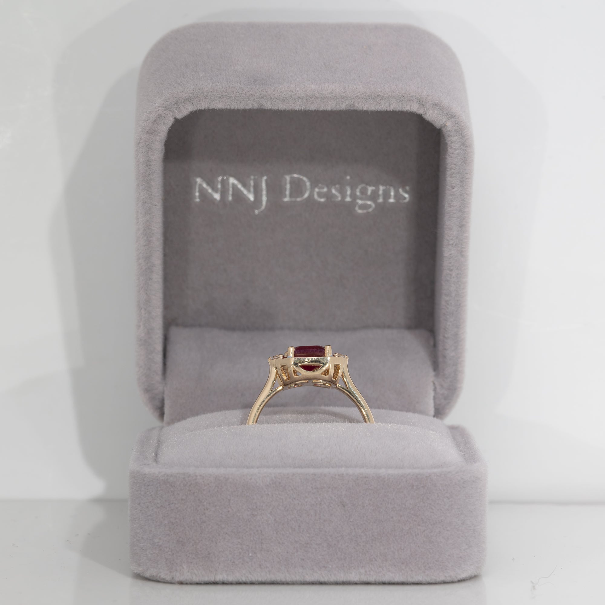 scarlet and gray ruby game day ring in 14K yellow gold