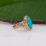 14K yellow gold turquoise cabochon ring with diamond accents