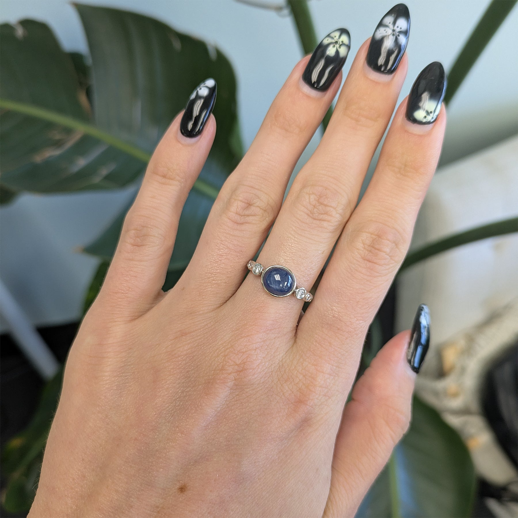 14K white gold blue star sapphire cabochon ring with diamonds