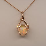 Ethiopian Opal Pendant Necklace with Earth Mined Diamond Accents in Solid 14K Gold – Oval 10x8mm Gemstone