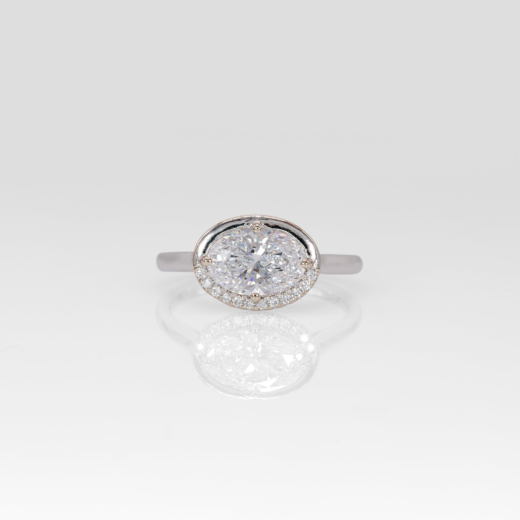 14K white gold oval lab grown diamond ring with diamond accents