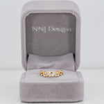 14K yellow gold diamond band