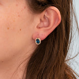 14K yellow gold London blue topaz oval stud earrings with diamond halo