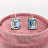 Solitaire Swiss Blue Topaz Drop Earrings in 14k Solid Gold | Emerald Cut | Customizable