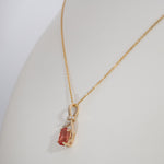 14K yellow gold padparadscha sapphire pendant