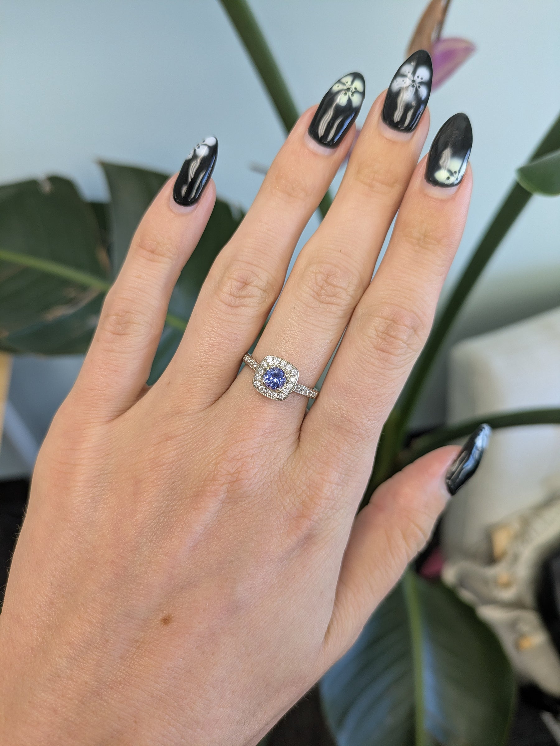 14K yellow gold tanzanite estate ring with diamond accents