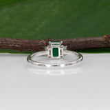 14K white gold Colombian emerald ring with diamond accents