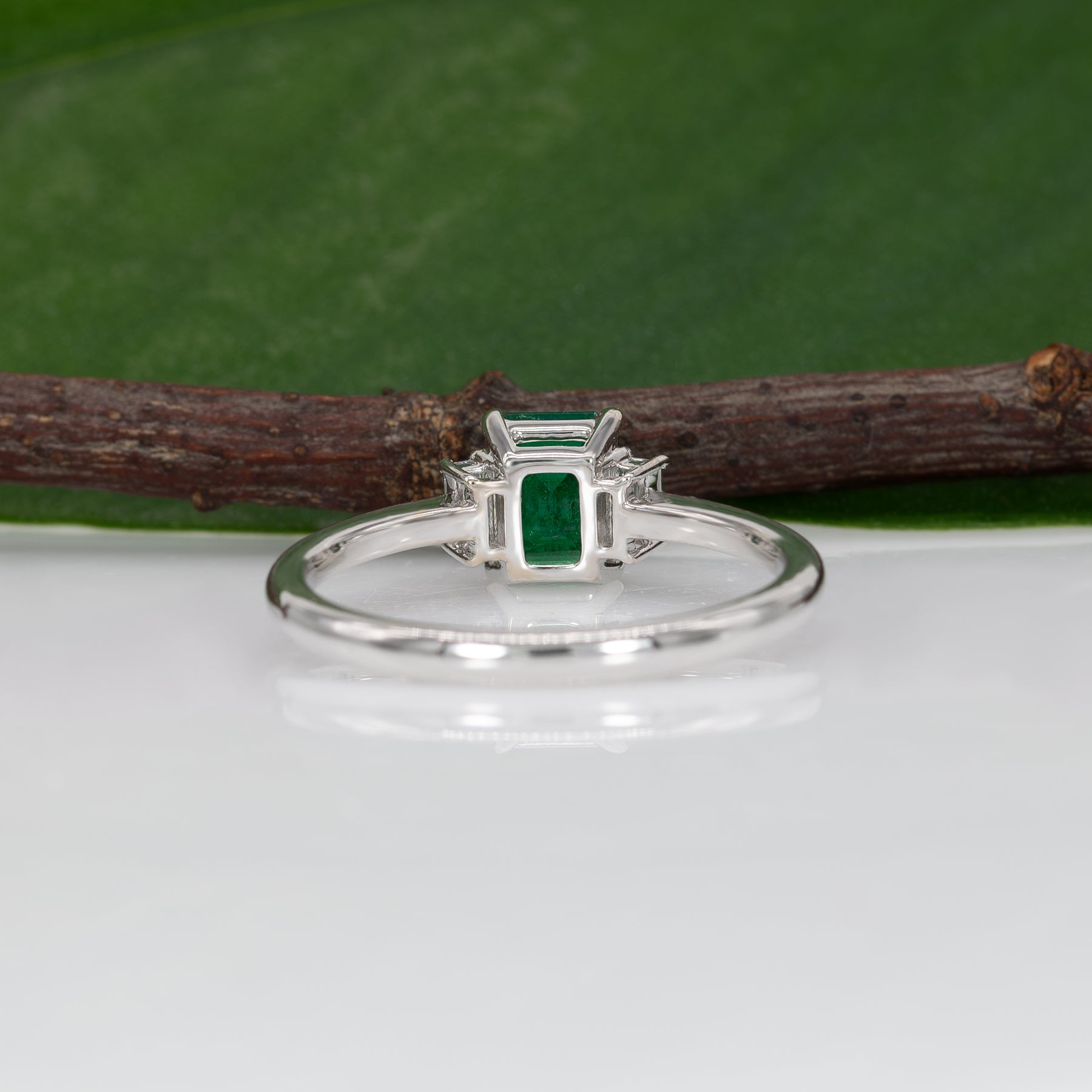 14K white gold Colombian emerald ring with diamond accents