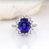 Isabelle 14K White Gold Tanzanite and Natural Diamond Halo Ring | OV 10x8mm