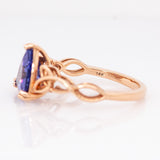 Dahlia Solid 14k Rose Gold Tanzanite Ring | Trillion Shaped, 9mm | Celtic love Knot Shank