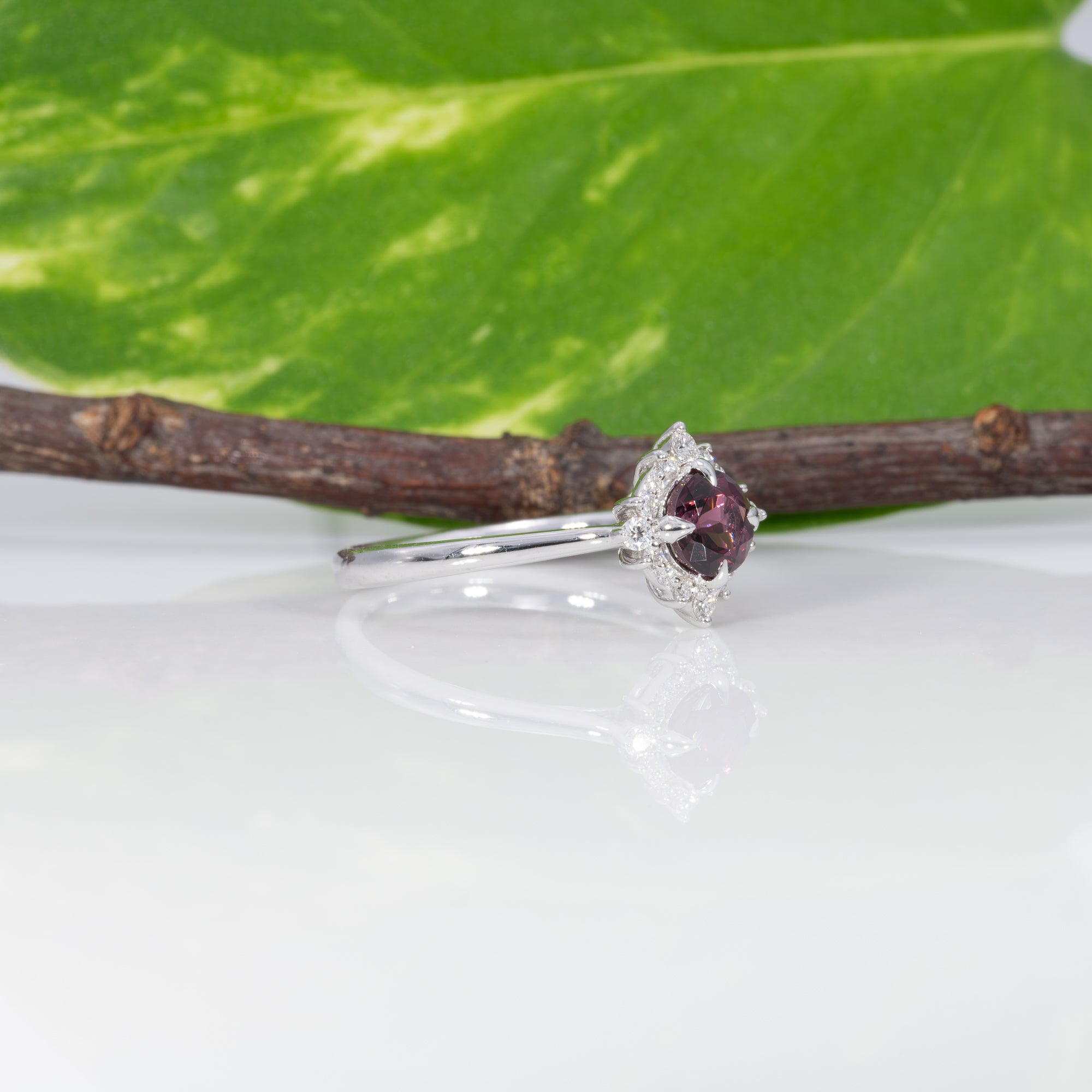 14K white gold red spinel ring with diamond halo