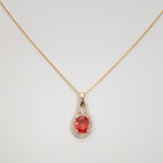 14K yellow gold padparadscha sapphire pendant