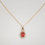 14K yellow gold padparadscha sapphire pendant
