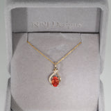 14K yellow gold padparadscha sapphire pendant