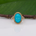 14K yellow gold turquoise cabochon ring with diamond accents