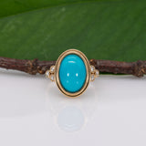 14K yellow gold turquoise cabochon ring with diamond accents