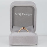 14K yellow gold red spinel ring with diamond accents