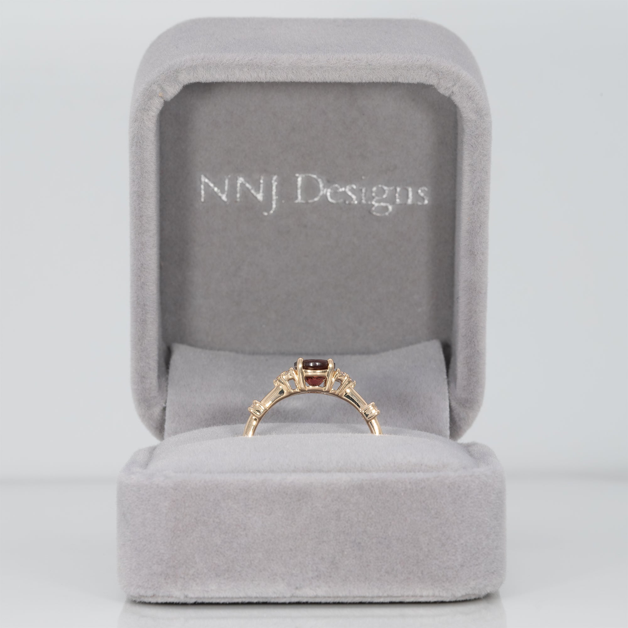 14K yellow gold red spinel ring with diamond accents