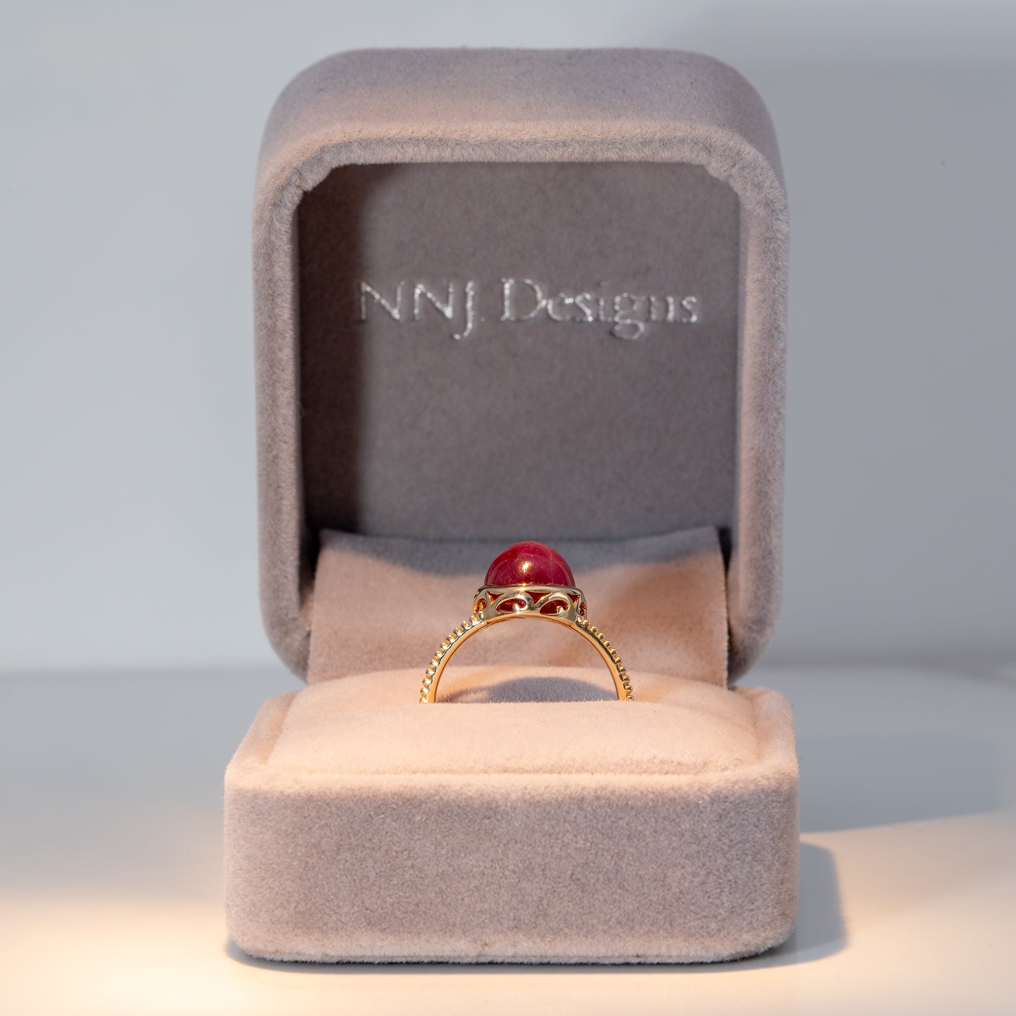 14K yellow gold star ruby cabochon ring with diamond accents