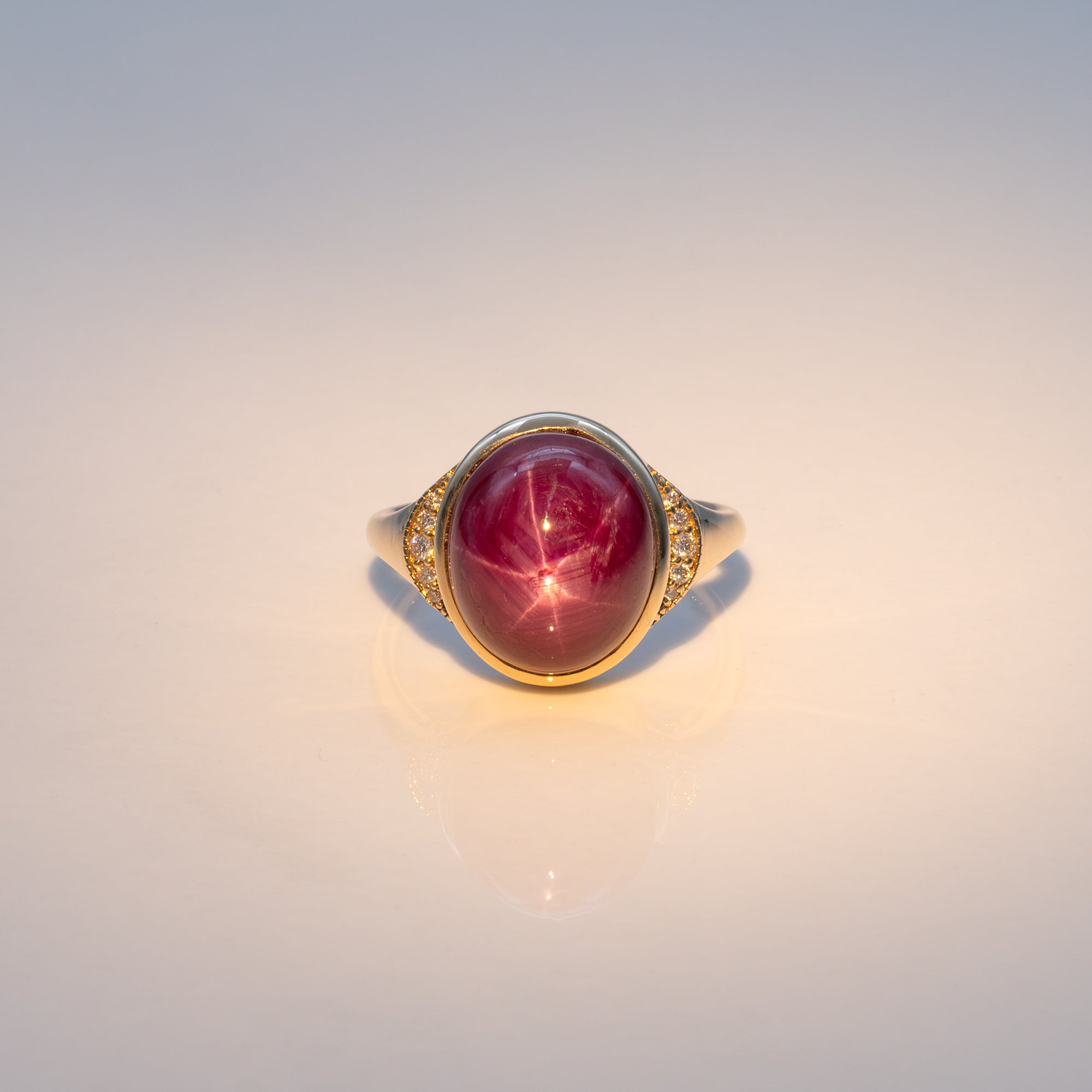 14K yellow gold star ruby cabochon ring with diamond accents