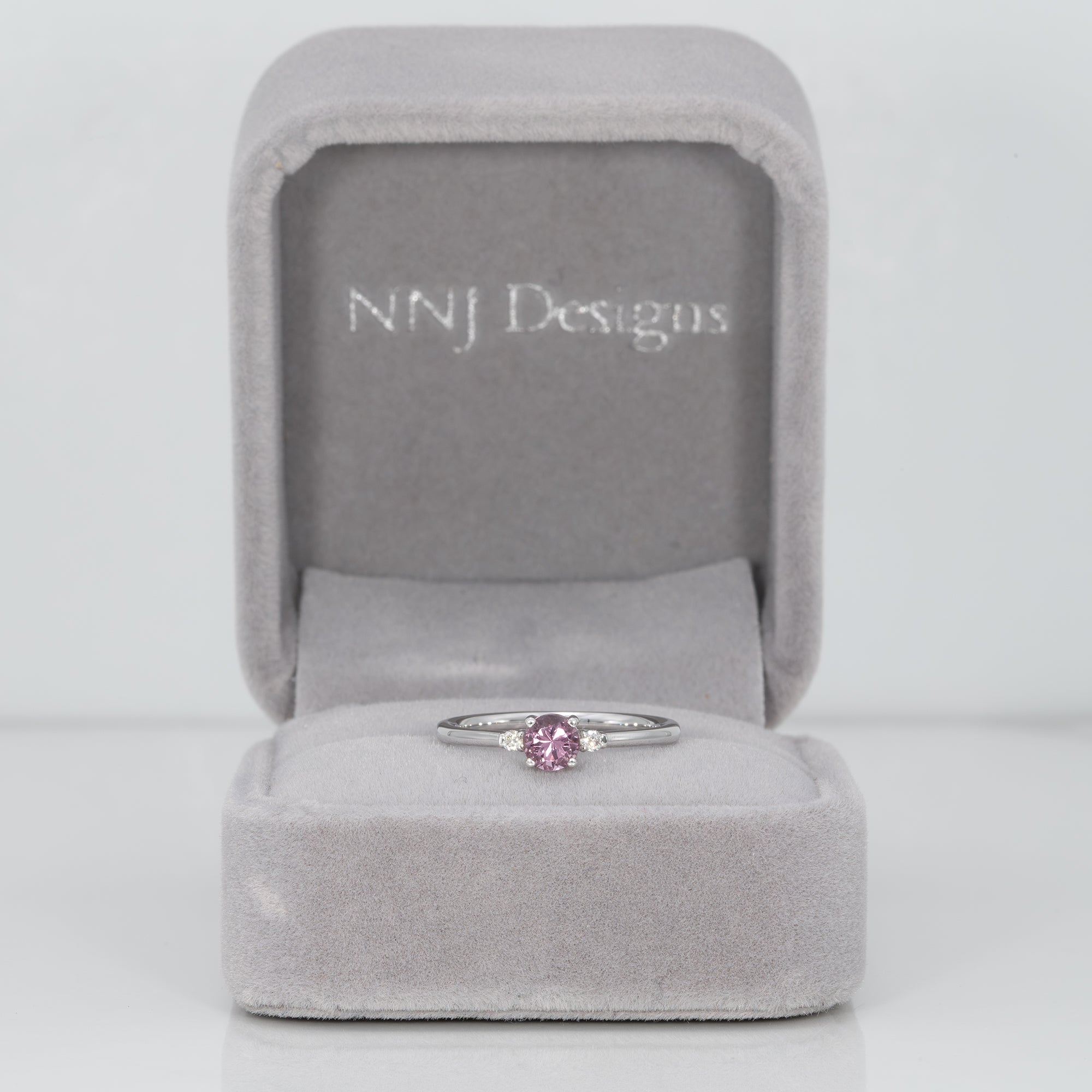 14K white gold minimal purple spinel ring with diamond accents
