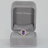 14K white gold pink sapphire oval ring with diamond halo