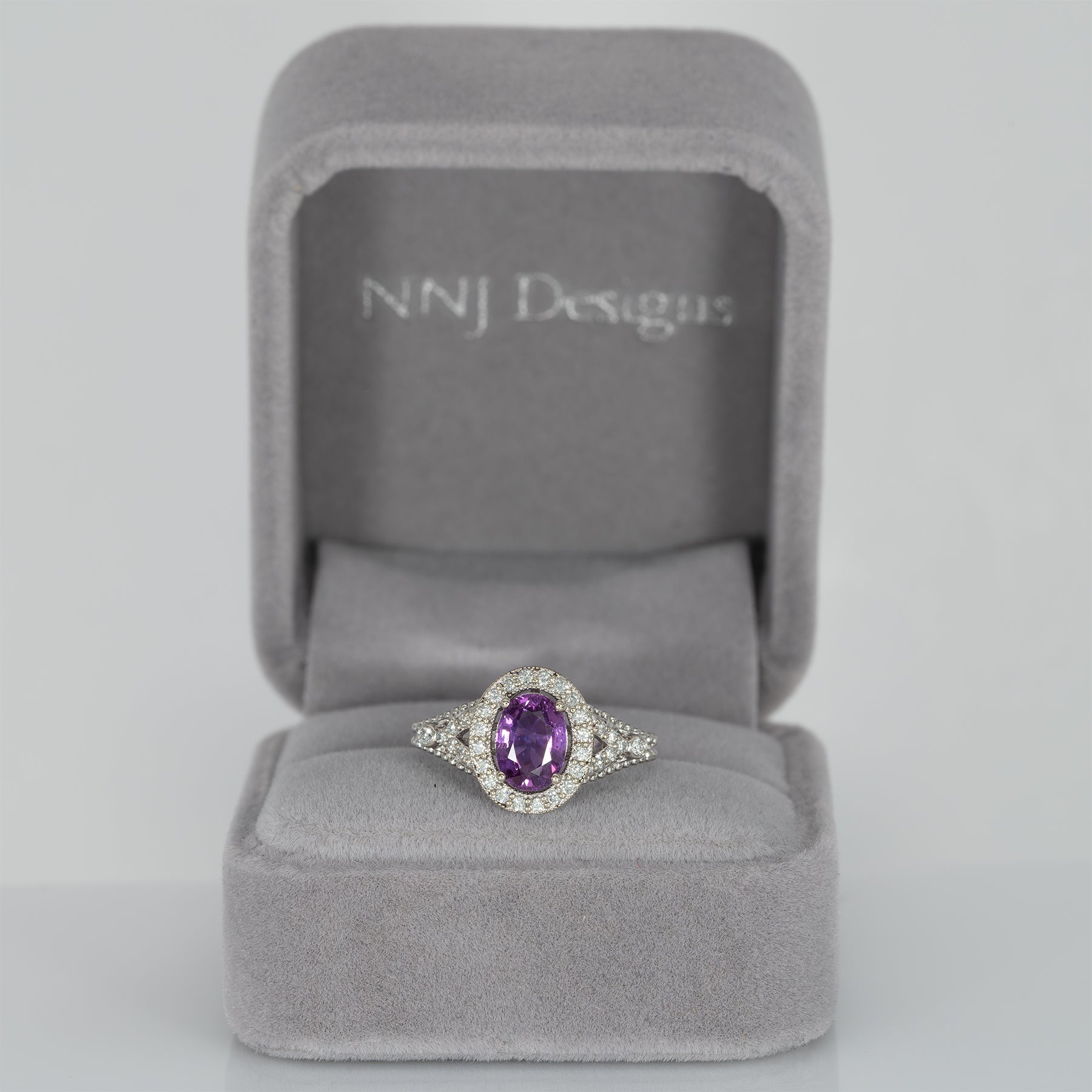 14K white gold pink sapphire oval ring with diamond halo