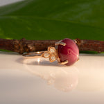 14K rose gold star ruby cabochon ring with diamond accents