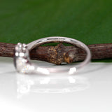 14K white gold purple spinel ring with diamond accents