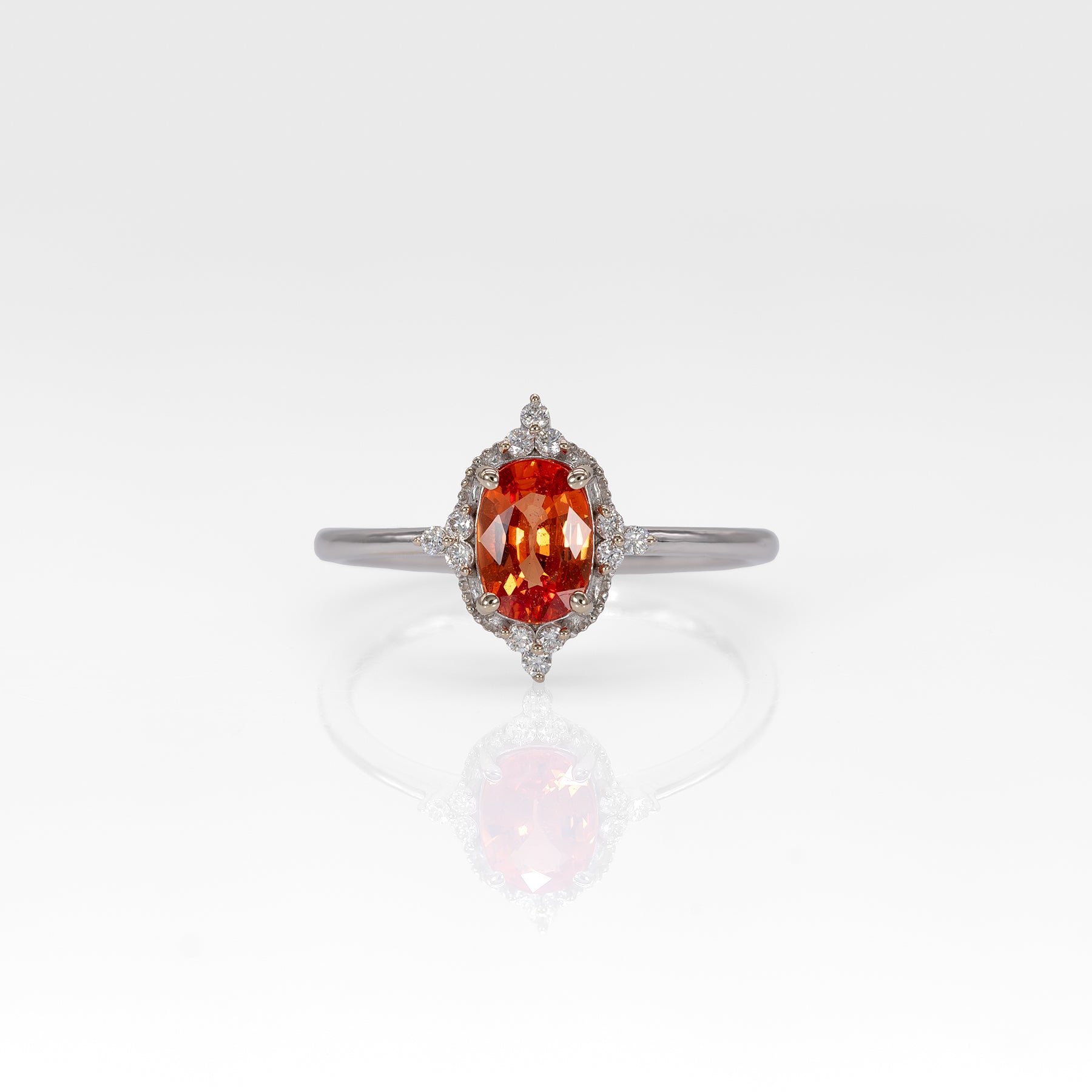 14K white gold padparadscha sapphire ring with diamond halo