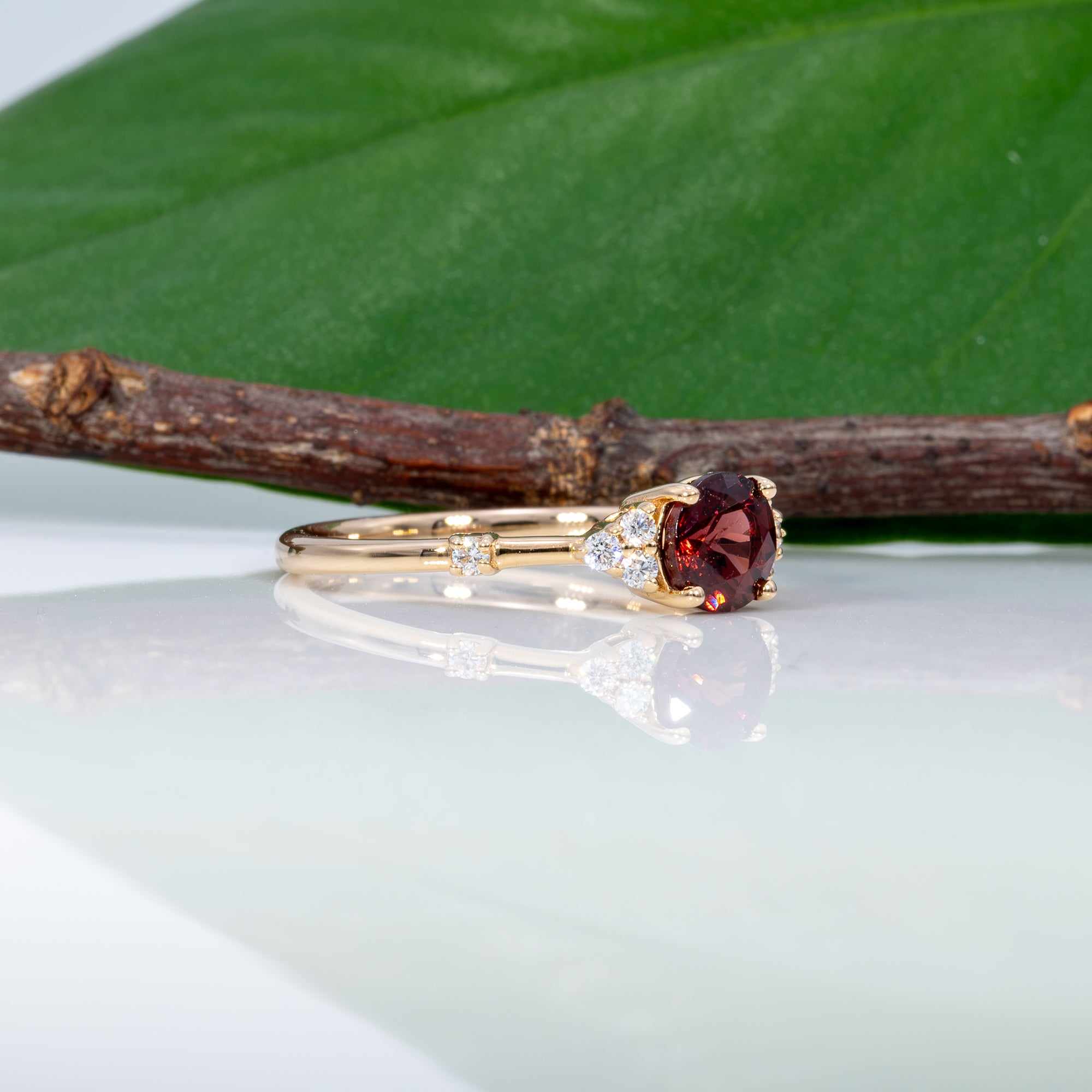 14K yellow gold red spinel ring with diamond accents