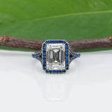 platinum lab grown diamond ring with blue sapphire accents