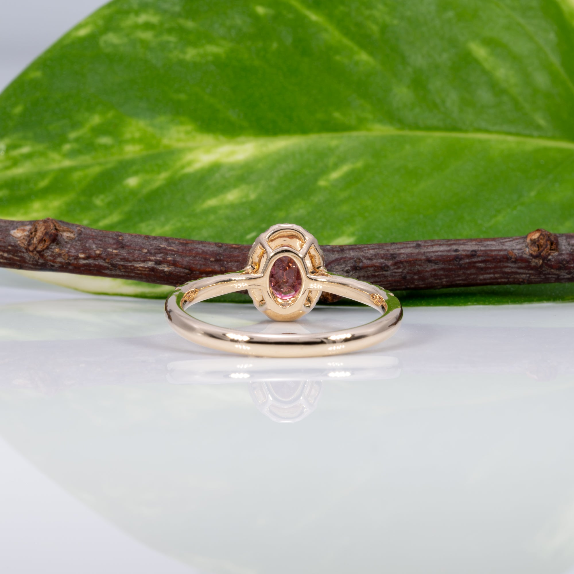 14K yellow gold padparadscha sapphire ring with diamond accents
