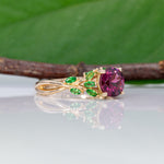 14K yellow gold purple garnet ring with tsavorite accents