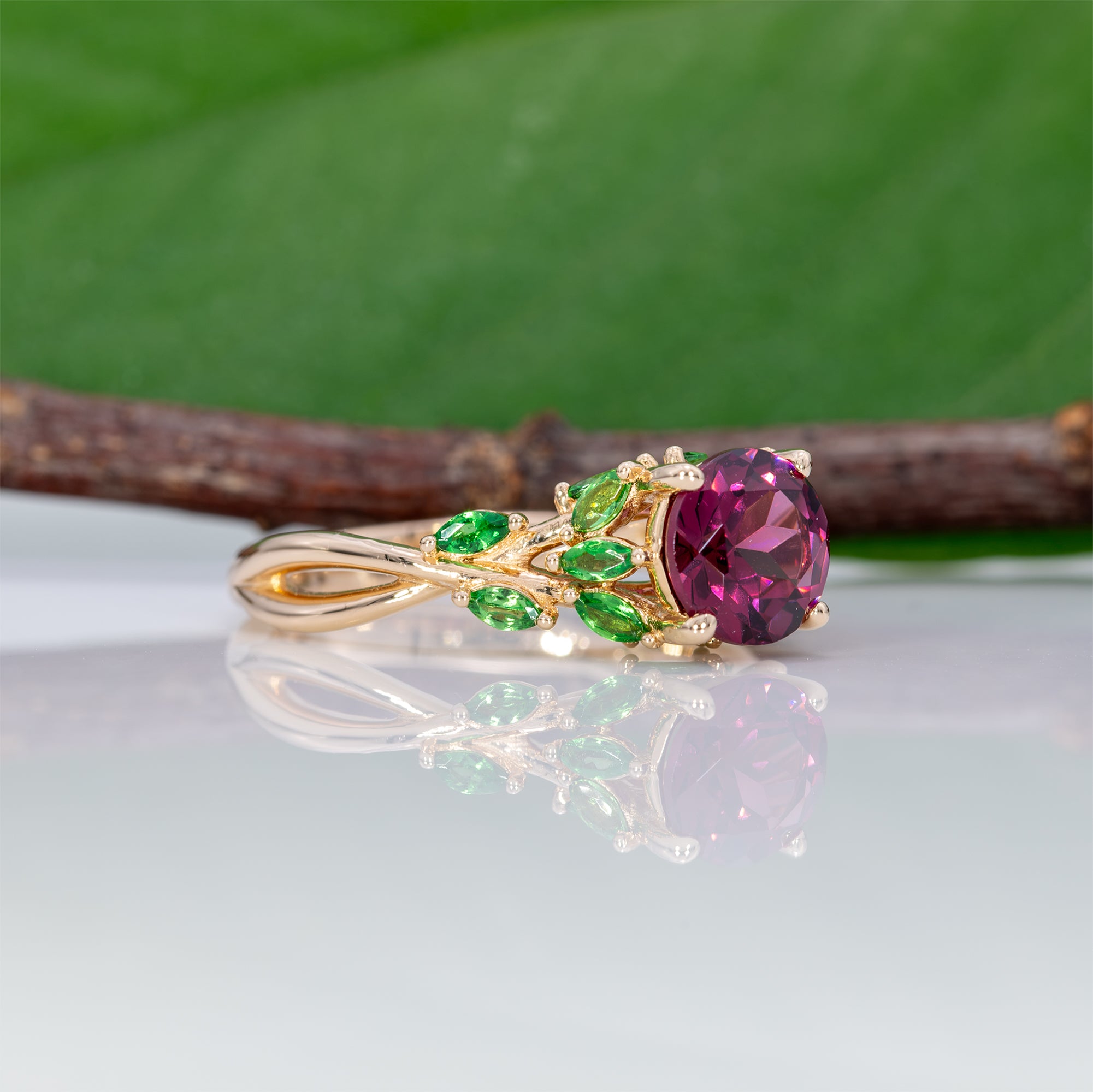 14K yellow gold purple garnet ring with tsavorite accents