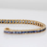 Previously Loved 14K Yellow Gold 6.60cts Ombre Sapphire Bracelet | 66 Sapphires