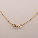 14K yellow gold colombian emerald pendant with diamond accents
