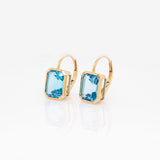 Solitaire Swiss Blue Topaz Drop Earrings in 14k Solid Gold | Emerald Cut | Customizable