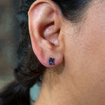 14K white gold tanzanite emerald cut stud earrings