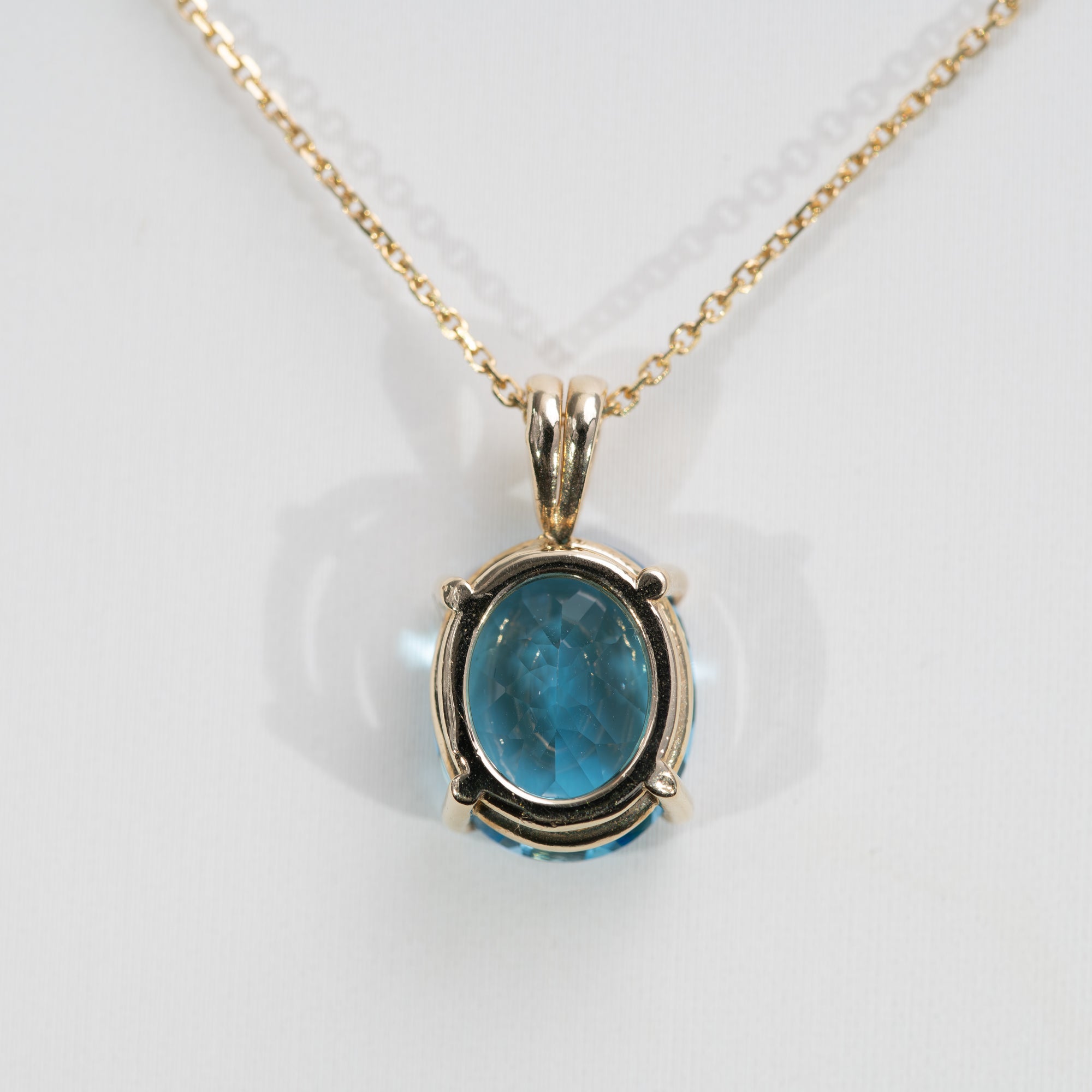 14K Yellow Gold Swiss Blue Topaz Pendant