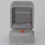 14K yellow gold padparadscha sapphire oval ring with diamond accents